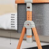 TINSY Woodline Pro Baby Bedside Crib with Wooden Finish Pattern & Aluminium Top Rail (Light Grey, Up to 25 kg), Adjustable Height & Anti-Reflux Tilt, Wheels & Rocking Function, Mosquito Net & Storage
